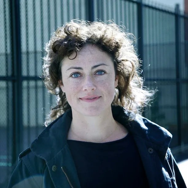 Portrait of a woman with curly hair